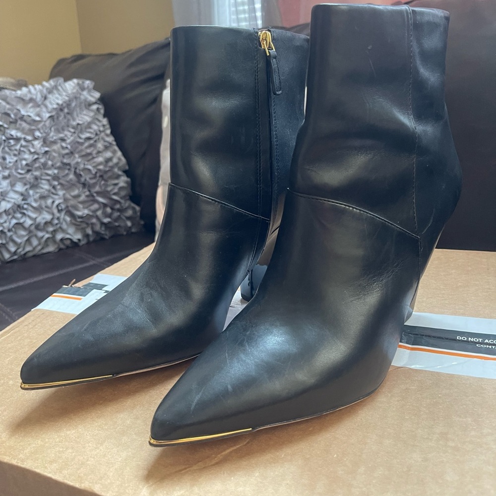 Tory Burch gold tipped leather booties